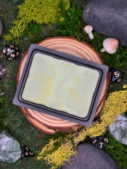 Miremoor fantasy wax melt with notes of enoki, moss, and earth, perfect for swamp or marshland settings.