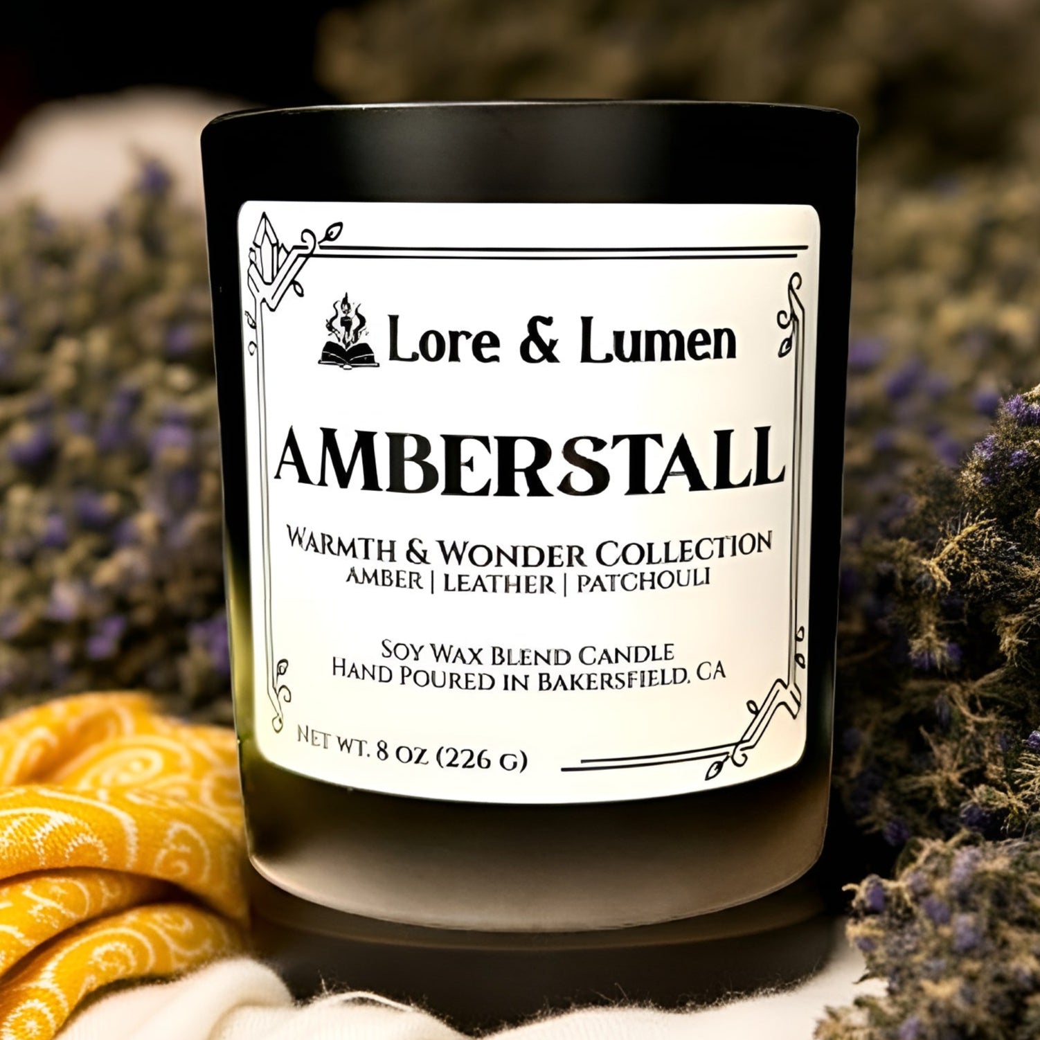 Amberstall fantasy candle with notes of vanilla and patchouli, styled for fantasy market scenes.