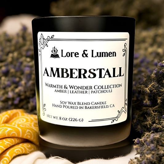 Amberstall fantasy candle with notes of vanilla and patchouli, styled for fantasy market scenes.