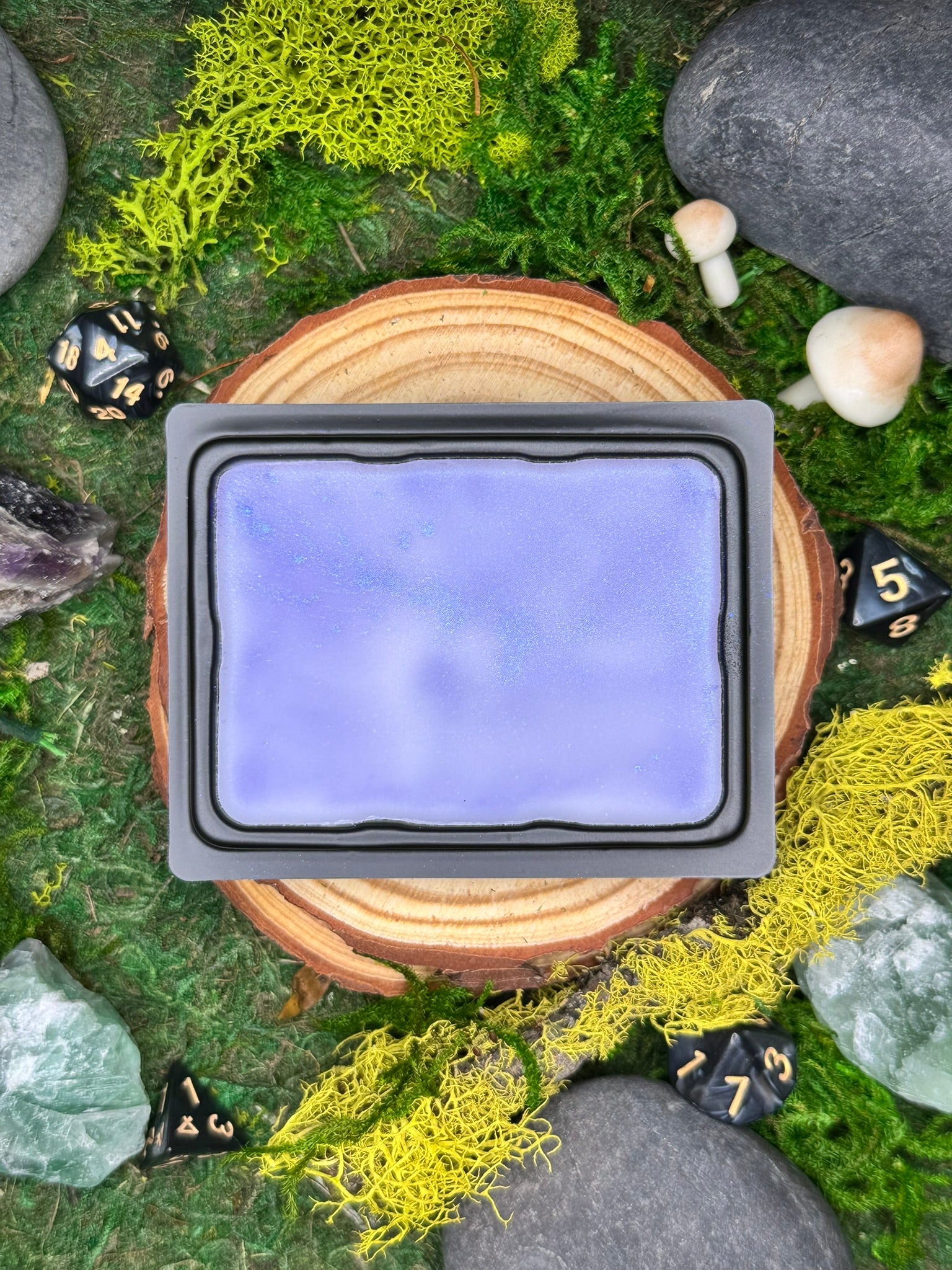 Deepglow fantasy wax melt with notes of sandalwood, plum, and damp stone, perfect for dungeon or cavern settings.