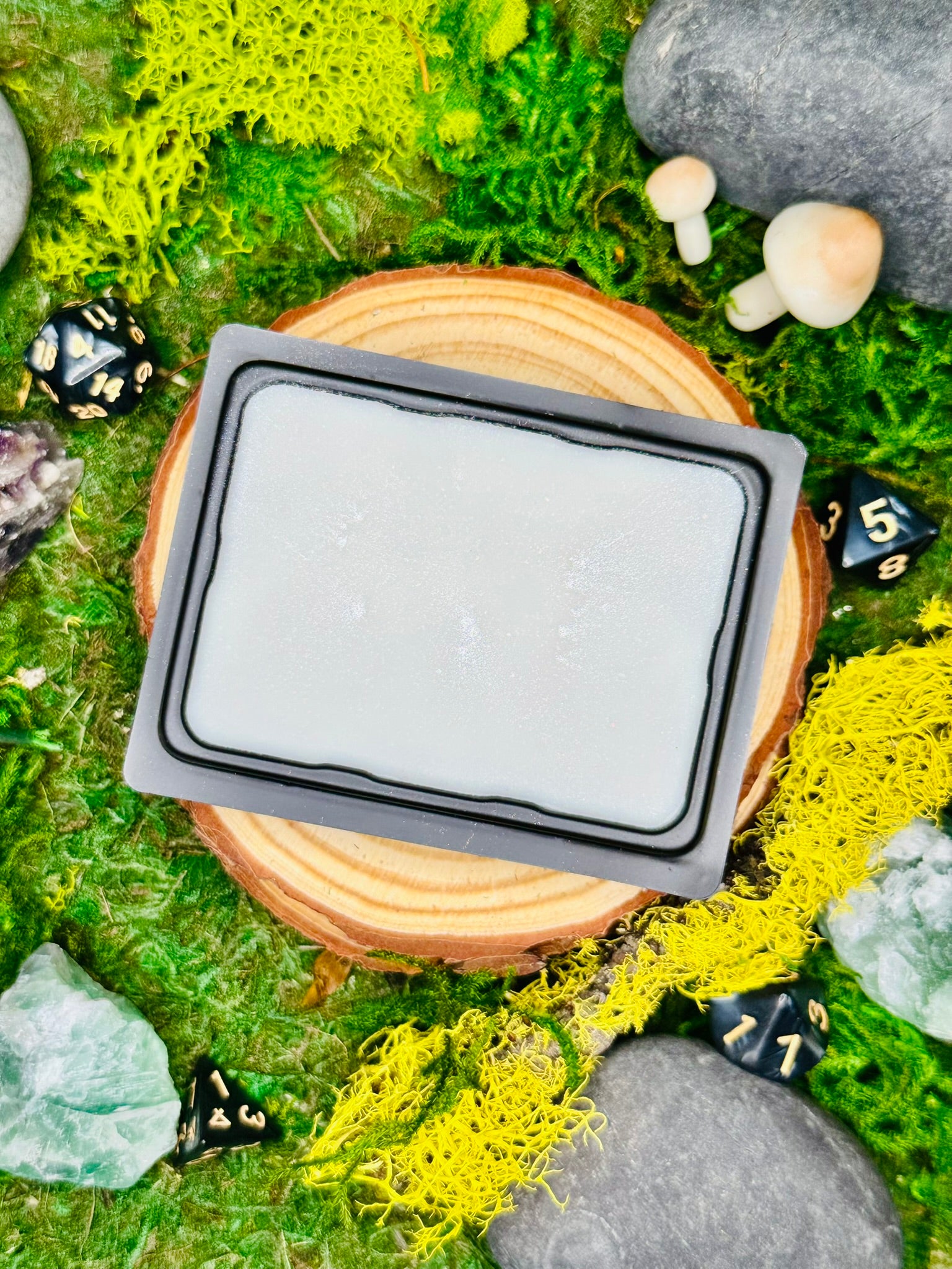 Frostveil fantasy wax melt with notes of cypress, fir, and evergreen, perfect for wintery or frosty realms.