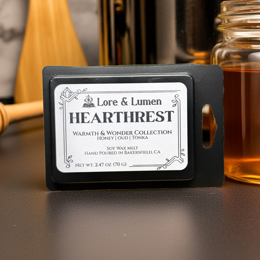 Hearthrest fantasy wax melt with notes of honey, oud, and tonka, perfect for post-quest relaxation scenes.