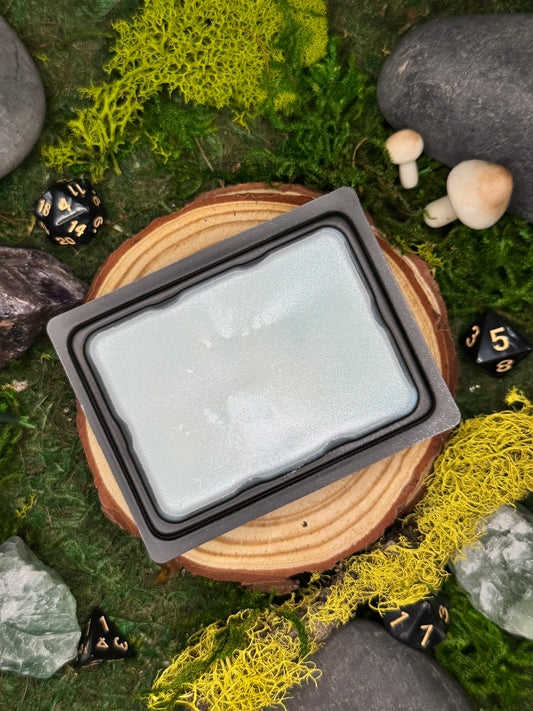 Highplains fantasy wax melt with notes of thistle, grass, and clover, perfect for open fields and meadows.