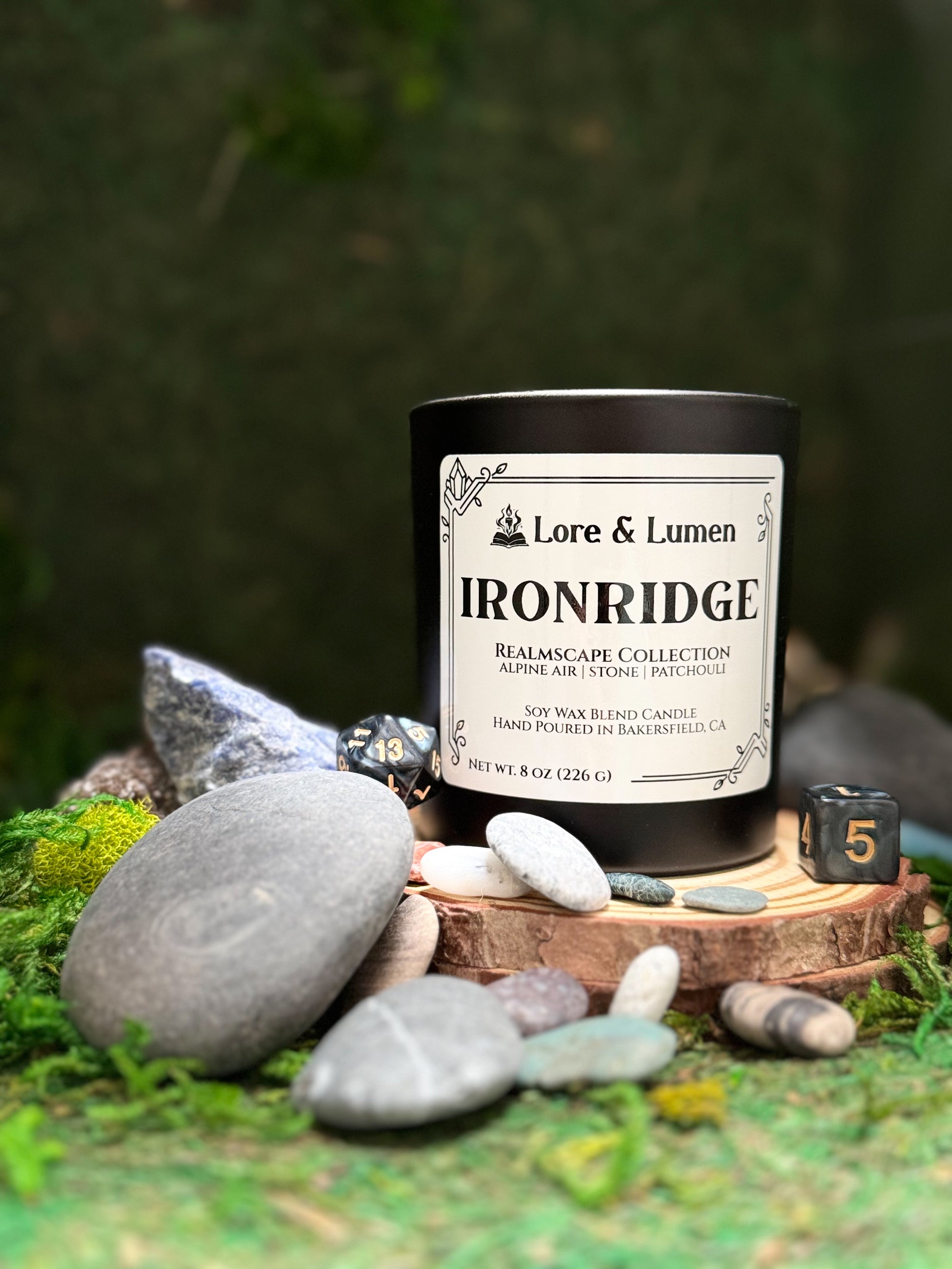 Ironridge fantasy candle with notes of alpine air, stone, and patchouli, styled for rugged mountain landscapes.