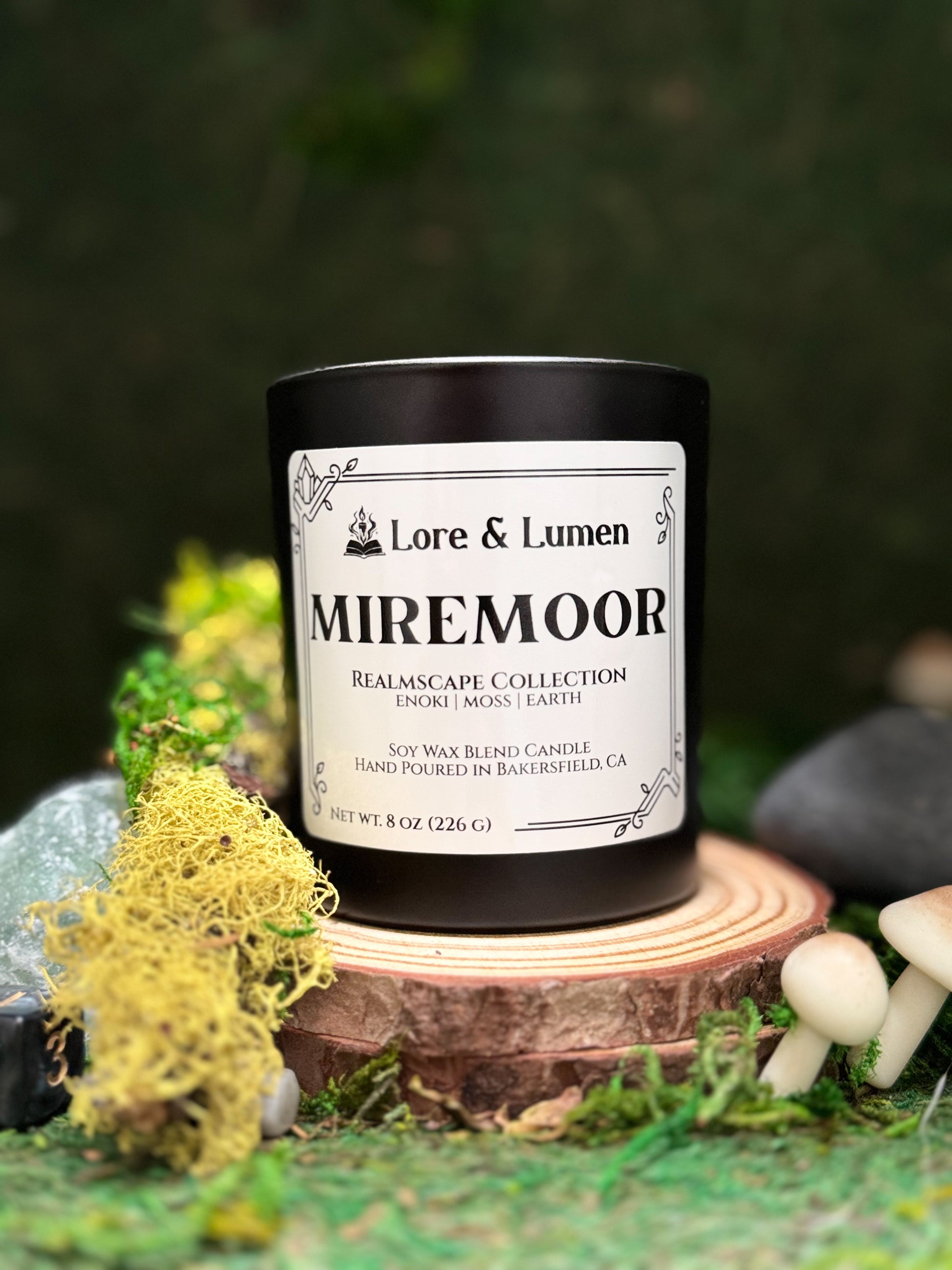 Miremoor fantasy candle with notes of enoki, moss, and earth, styled for swamp or marshland settings.