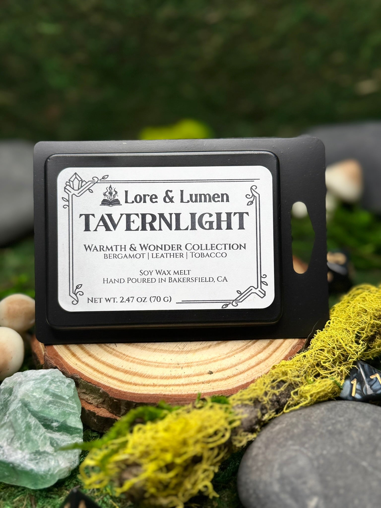 Tavernlight fantasy wax melt with notes of bergamot, leather, and tobacco, perfect for cozy tavern interiors.