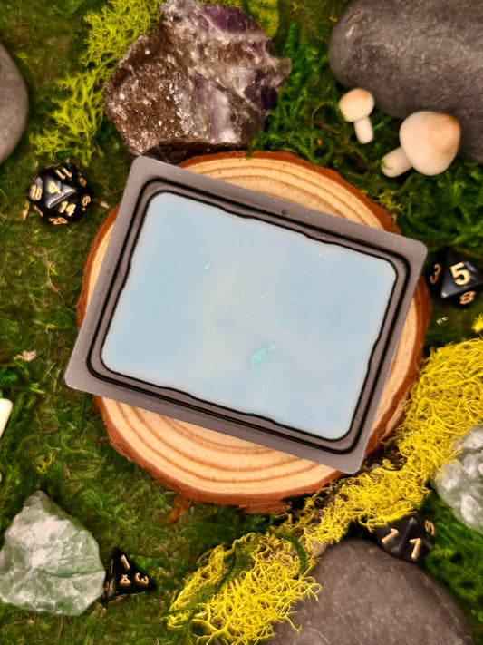 Tidewake fantasy wax melt with notes of ocean air and driftwood, perfect for coastal or sea-themed campaigns.